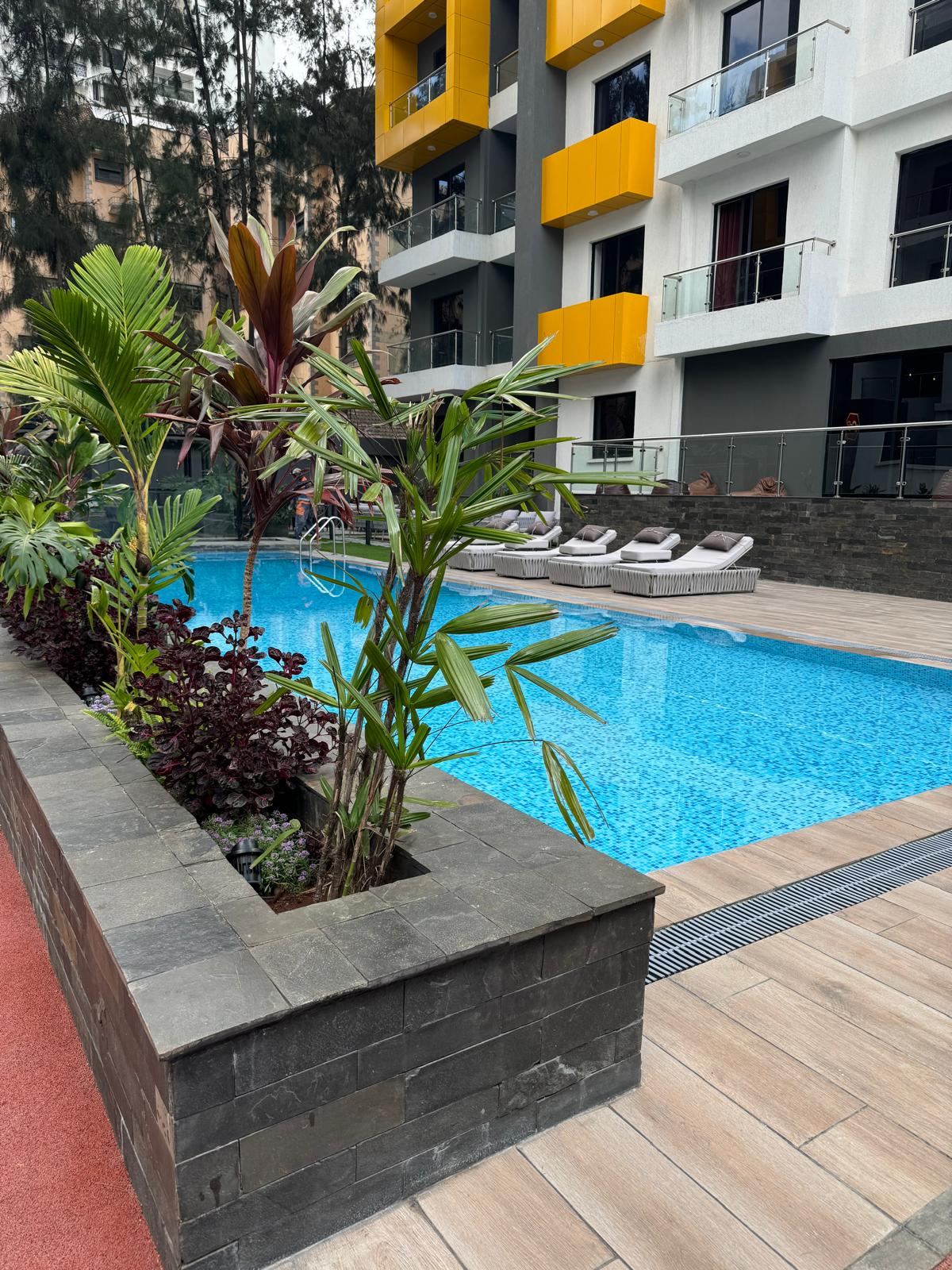 Pool beside a modern residential block